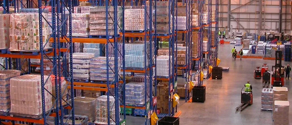 Representative view of a commercial warehouse with tall storage racks.